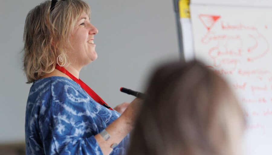 Image of a woman delivering a training session.